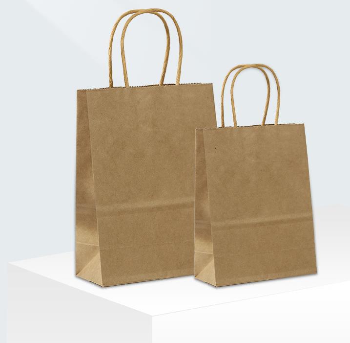 Veľkoobchodná recyklovateľná hnedá nákupná kraft papierová taška s logom na mieru s krútenou plochou rukoväťou